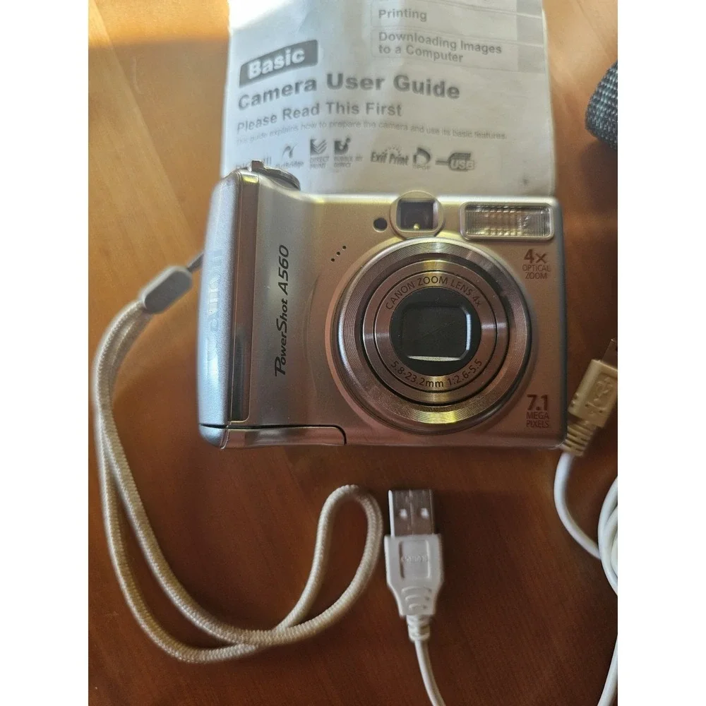 Canon PowerShot A560 7.1MP Digital Camera - Silver Read Description